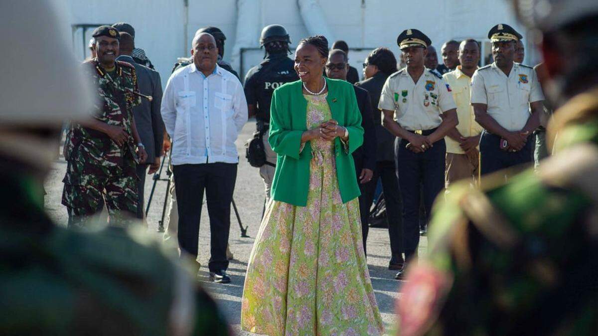 Former Kenyan Foreign Minister Monica Juma speaks during a ceremony as Haitian government officials visit the Kenyan police force at their base in the Clercine neighborhood of Port-au-Prince on June 26, 2024. Kenyan police arrived in violence-ravaged Haiti on June 25 on a long-awaited mission to help wrest the Caribbean nation from powerful gangs, just as Nairobi saw its own deadly turmoil during mass protests. (Photo by Clarens SIFFROY / AFP) (Photo by CLARENS SIFFROY/AFP via Getty Images)