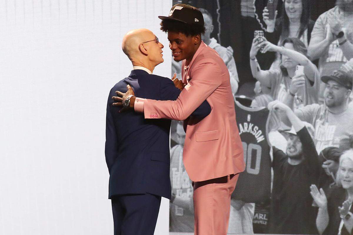 Jun 22, 2023; Brooklyn, NY, USA; Taylor Hendricks (UCF) is greeted by NBA commissioner Adam Silver after being selected ninth by the Utah Jazz in the first round of the 2023 NBA Draft at Barclays Arena. Mandatory Credit: Wendell Cruz-USA TODAY Sports