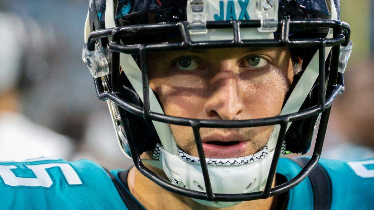 Jacksonville Jaguars tight end Tim Tebow paces the sideline during the first half of an NFL preseason football game against the Cleveland Browns, Saturday, Aug. 14, 2021, in Jacksonville, Fla.