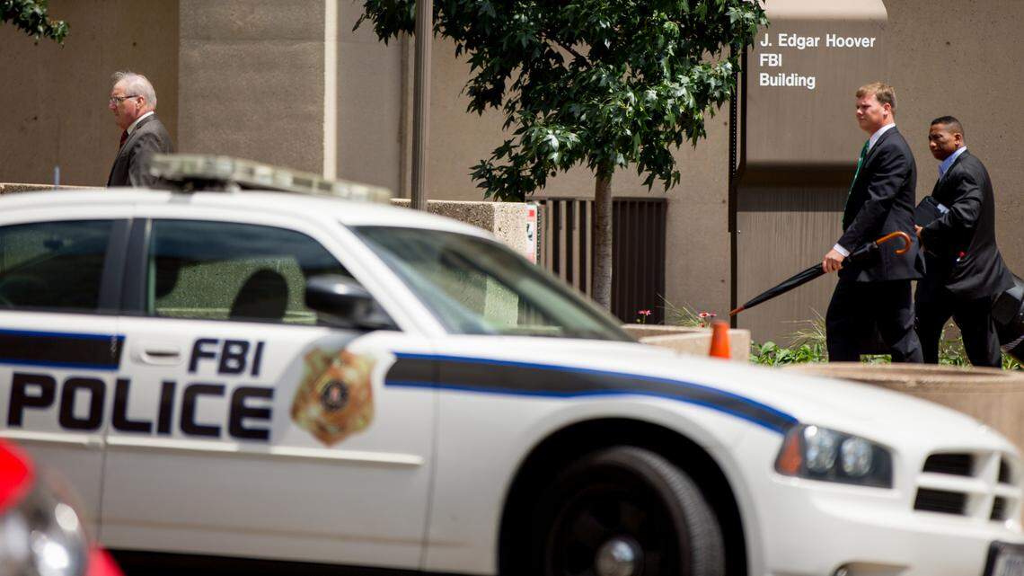 The J. Edgar Hoover Building, the FBI headquarters, is seen in August 2015 in Washington, D.C. A fugitive convicted of killing his wife in 1994 in Colombia was found living under a fake name in Massachusetts, the FBI says. He was arrested.