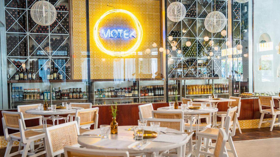 The dining room and wine cellar at the new Motek Israeli Mediterranean restaurant in Coral Gables.