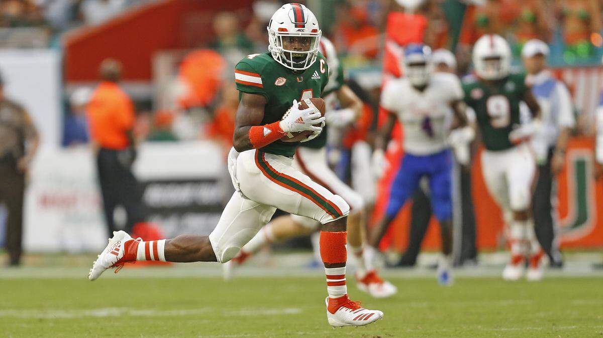 Jeff Thomas of the Miami Hurricanes runs for a second-quarter touchdown against the Savannah State Sept. 8.