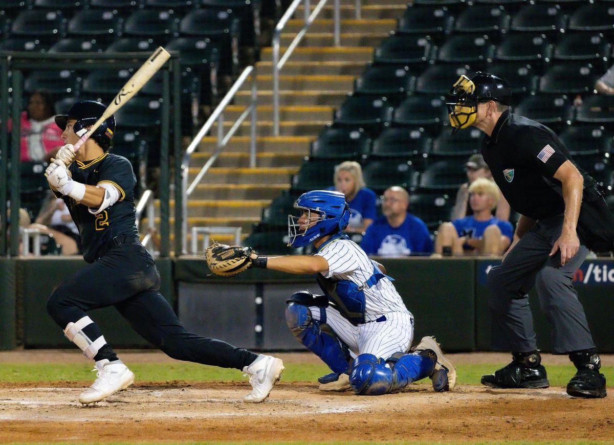 American Heritage Patriots RJ Machado (2) hits the ball against the Mulberry Panthers in the fourth inning of their Class 4A state baseball championship game at Hammond Stadium on Tuesday, May 20, 2025, in Fort Myers, Fla.