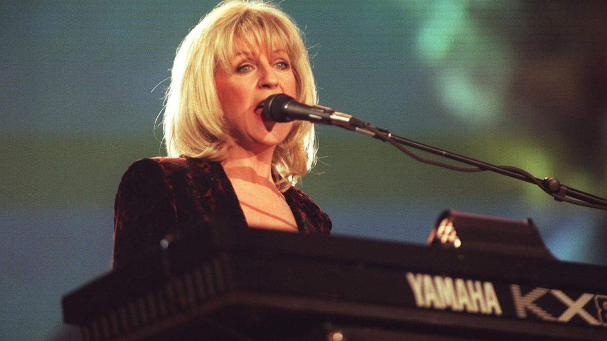 Fleetwood Mac’s Christine McVie performs at the Brit Awards at the London Docklands Arena in Feb. 9, 1998. McVie has died at the age of 79, her family has said.