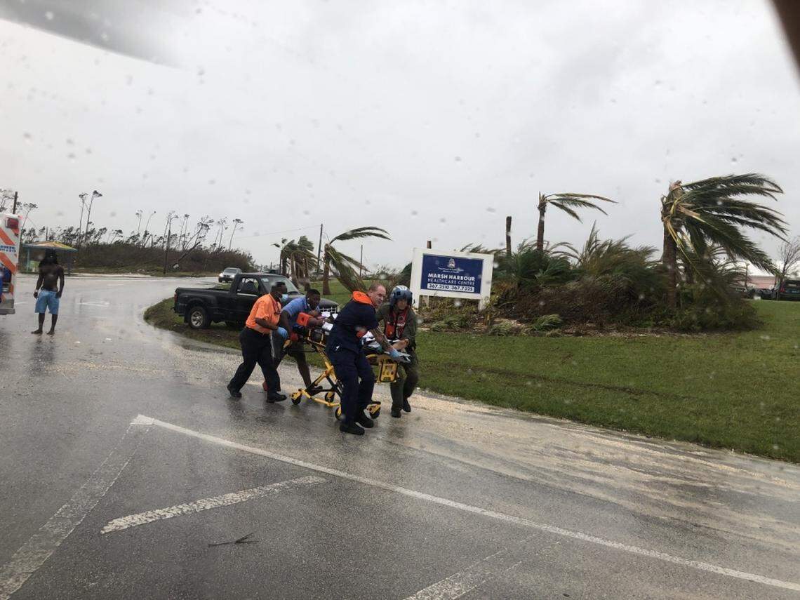 Coast Guard crews help evacuate a patient in the Bahamas during Hurricane Dorian. The Coast Guard is supporting the Bahamian National Emergency Management Agency and the Royal Bahamian Defense Force with hurricane response efforts.
