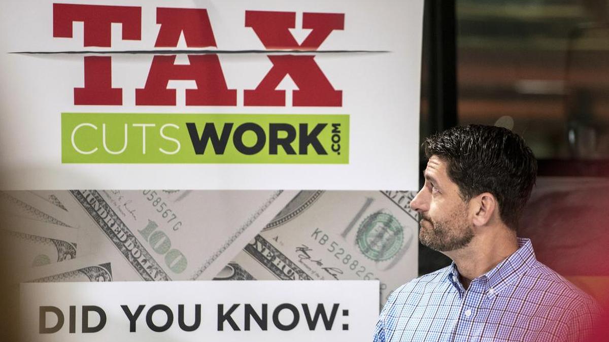 House Speaker Paul Ryan glances back at a sign at the “Tax Cuts Work” event at Jakes Electric in Clinton, Wis., on Aug. 24. Ryan said he wants the full House to vote on a second round of tax cuts before the end of September. The markets may get a look at the legislation in the week ahead.