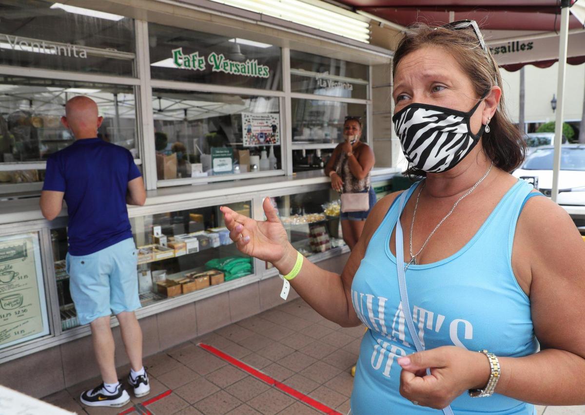 Yolanda Valdes of Union City, New Jersey, comments on the habits of loud talkers and scientific findings on the increased risk of COVID-19 transmission by people who shout or speak at high volume. She was visiting Miami.