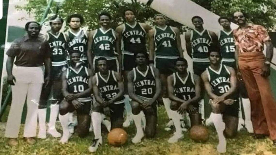 Irv Baulkman (left) poses with the players he coached on the 1978 Miami Central boys’ basketball state championship team. Baulkman passed away recently at age 79.