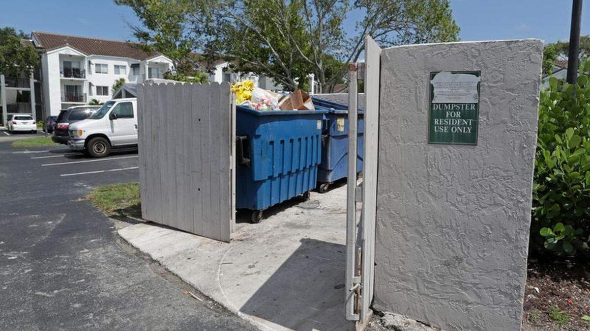 Dumpsters pictured after a newborn baby was found near them at a Boca Estrada apartment complex in Boca Raton on Wednesday, May 8, 2019.
