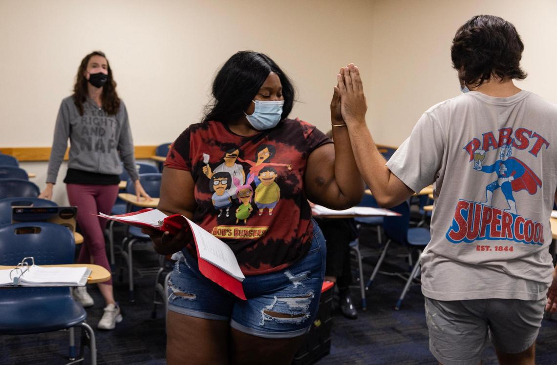 Perry watches the beginning of the scene before the kiss happens as Noelle Nicholas dances with Samuel Krogh. “The kiss is part of the whole story,” Perry said. “I need to know how we get to this moment and how we get out of this moment.”