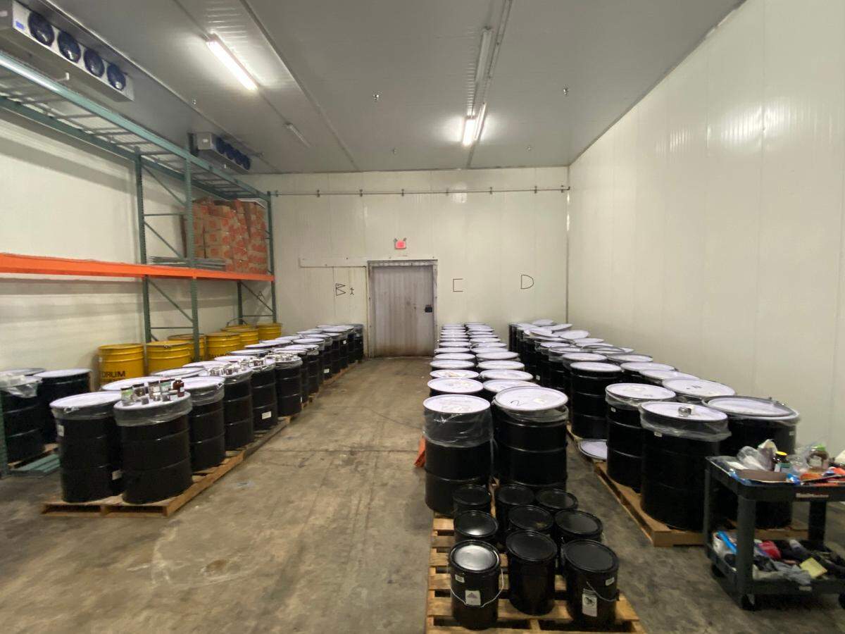 Rows of barrels are lined up inside a refrigerated South Florida warehouse. The barrels contain samples from the 2010 BP Deepwater Horizon oil spill.