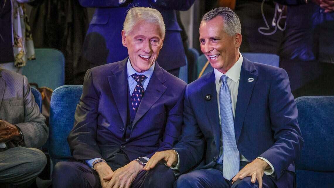 Clinton helps Jolly raise millions then sings his praises at South Florida church