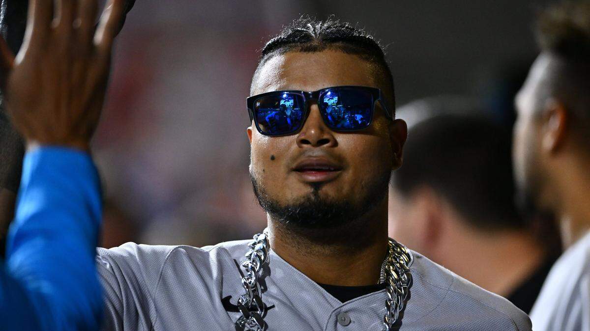 Miami Marlins second baseman Luis Arraez (3) celebrates with teammates after hitting a home run against the Philadelphia Phillies in the seventh inning at Citizens Bank Park on Tuesday, April 11, 2023.