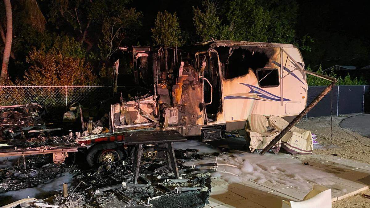 A trailer destroyed by fire is parked in a Key Largo neighborhood Tuesday, July 18, 2023.