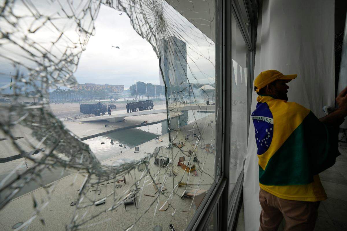 Police in riot gear from up outside Planalto Palace after protesters, supporters of Brazil’s former President Jair Bolsonaro, stormed the Palace in Brasilia, Brazil,.