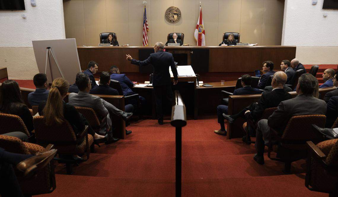 Alan Lawson, an attorney for Emilio González, points to a printed 1855 Miami Constitution during a hearing at the Third District Court of Appeal for a case González brought against the city of Miami on Tuesday, July 29, 2025, in Miami.