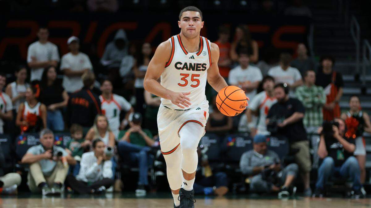 Miami Hurricanes guard Dante Allen (35) dribbles the basketball against the Stetson Hatters during the first half at Watsco Center in Coral Gables, Florida, on Monday, Nov. 10, 2025.