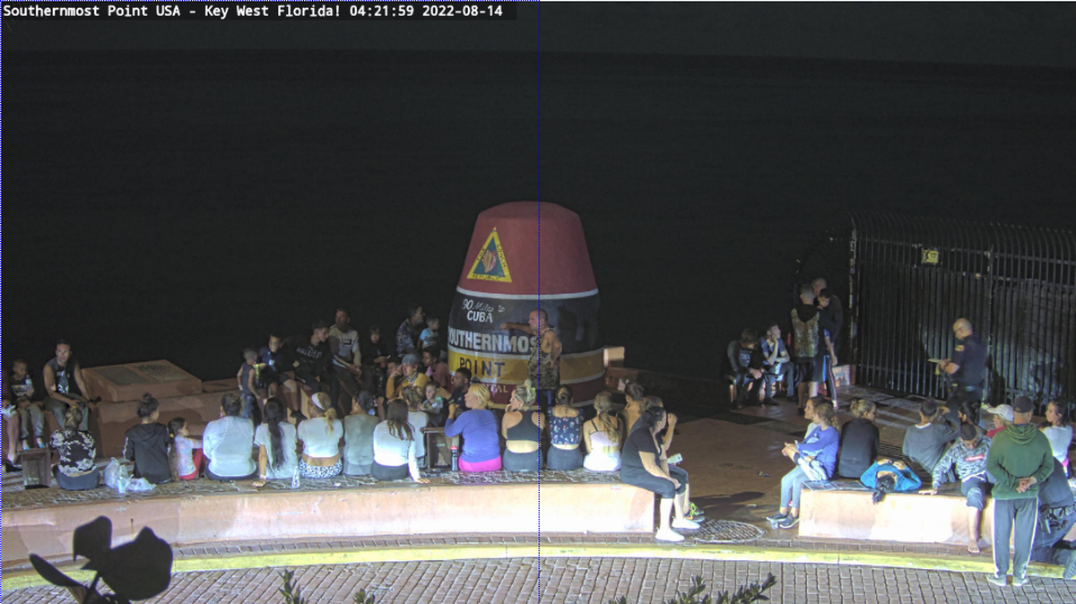 Fifty-one Cuban migrants arrived at the Southernmost Point buoy in Key West in the early morning hours of Sunday, Aug. 14, 2022, said Adam Hoffner, division chief for U.S. Customs and Border Protection’s Miami operations. At 4:21 a.m., the Southernmost Webcam showed dozens of men, women and children waiting by the buoy.