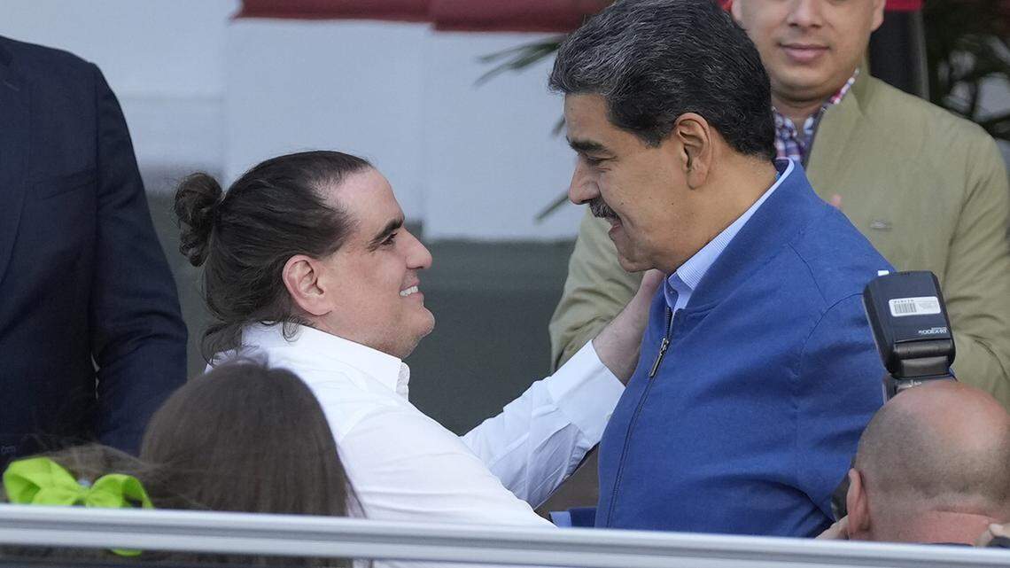 Venezuelan President Maduro, right, receives Alex Saab at Miraflores presidential palace in Caracas, Venezuela, Wednesday, Dec. 20, 2023. The United States freed Saab, who was arrested on a U.S. warrant for money laundering in 2020, in exchange for the release of 10 Americans imprisoned in Venezuela, U.S. officials said Wednesday. 