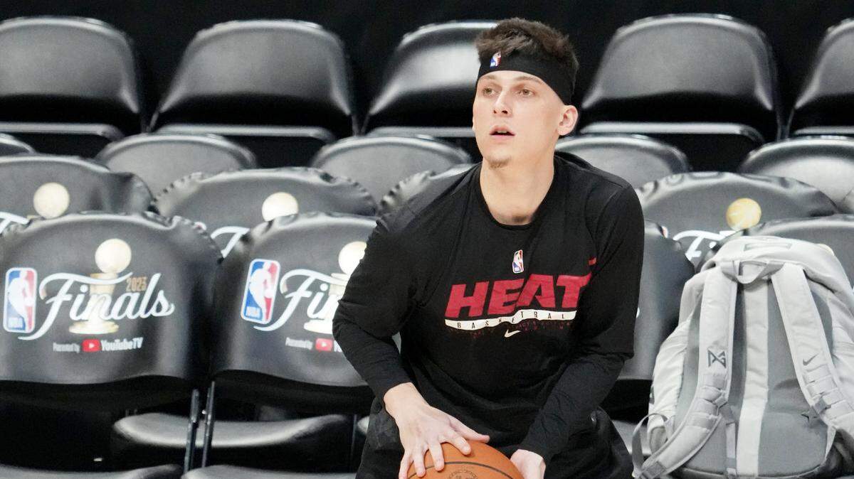 Miami Heat guard Tyler Herro (14) prepares to shoot a ball during a practice session on media day before the 2023 NBA Finals at Ball Arena.