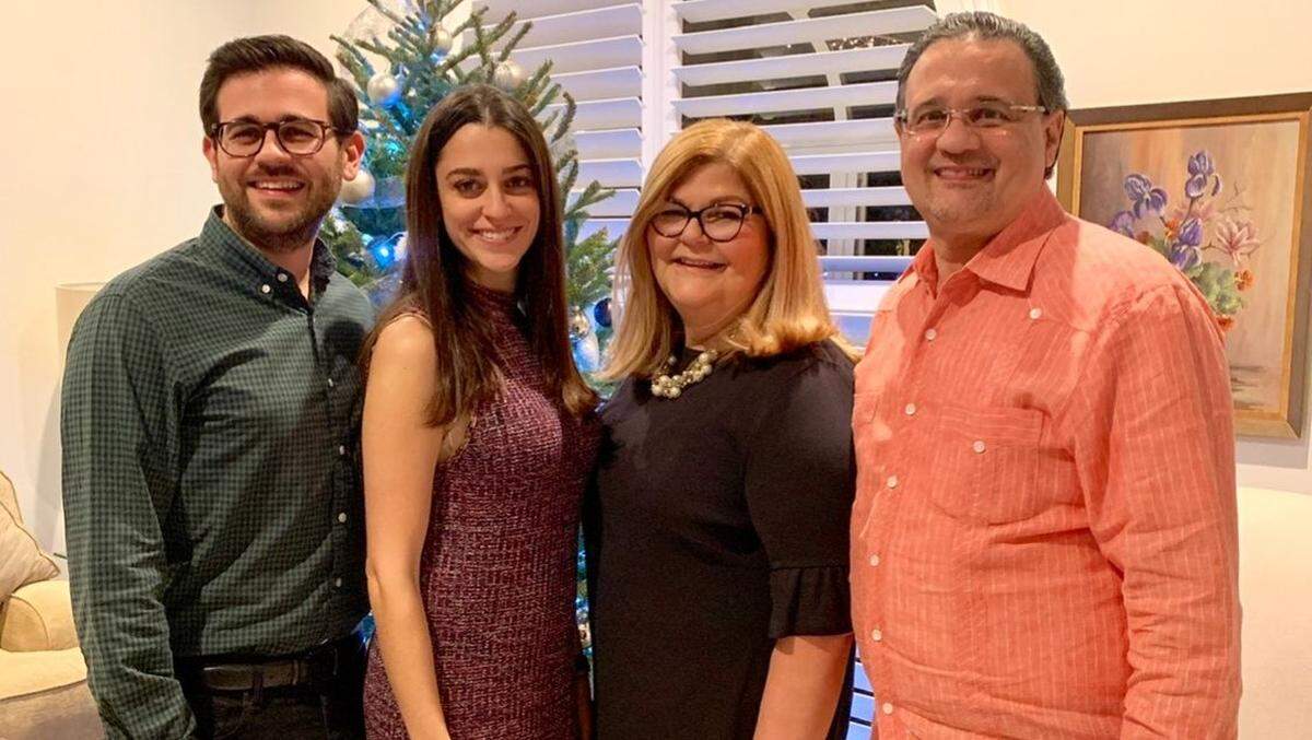Mercedes and Raymond Urgelles with their children, Danny and Jenny. They moved to their Surfside dream condo after their children went off to college.