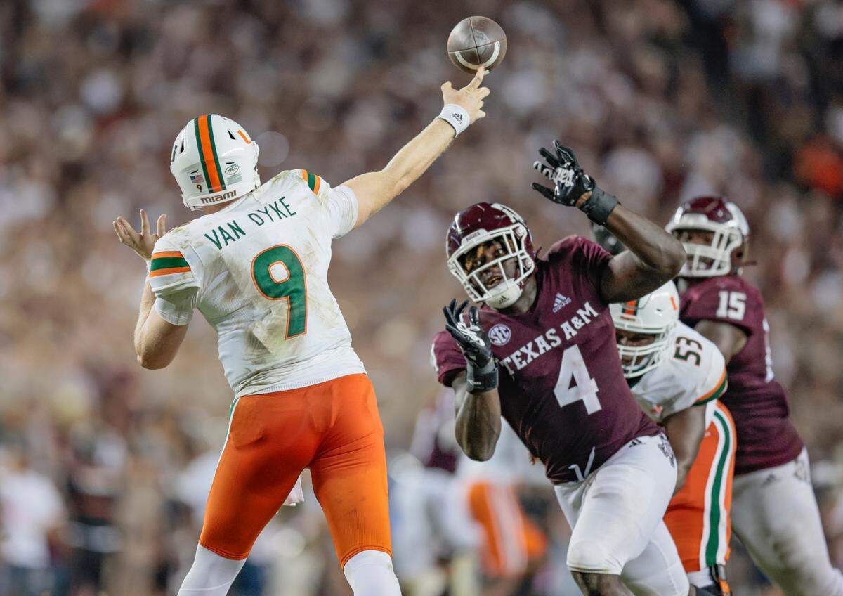 Texas A&M Aggies defensive lineman Shemar Stewart (4) pressures Miami Hurricanes quarterback Tyler Van Dyke (9) in the second half at Kyle Field, Bryan College Station, Texas on Saturday, September 17, 2022.