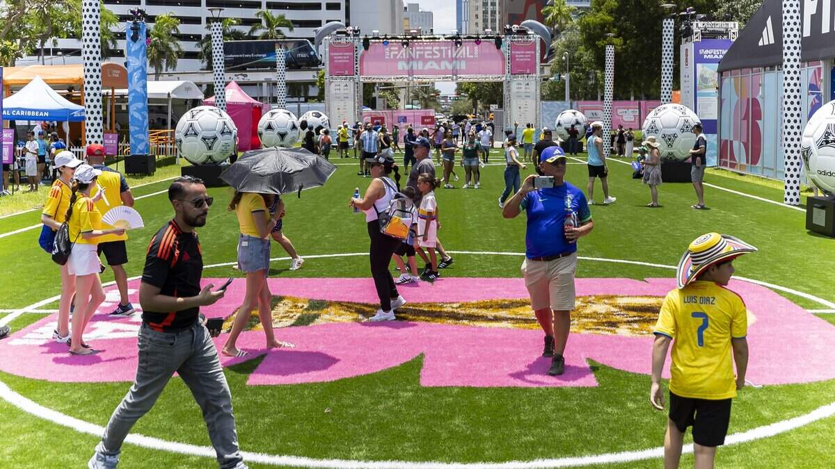 People make their way through the FIFA Fan Festival Miami at Bayfront Park on Saturday, June 13, 2026, in downtown Miami.