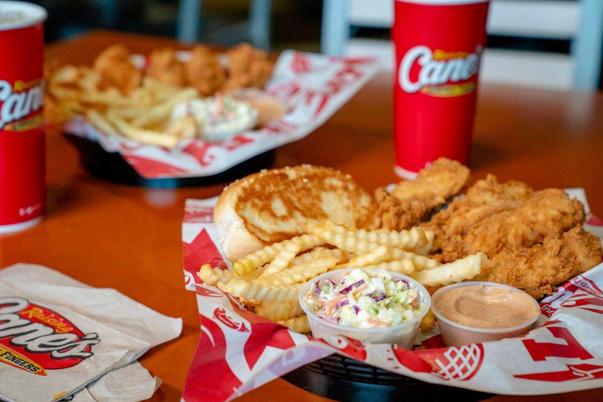 Raising Cane’s is famous for its chicken tenders and Cane’s sauce.