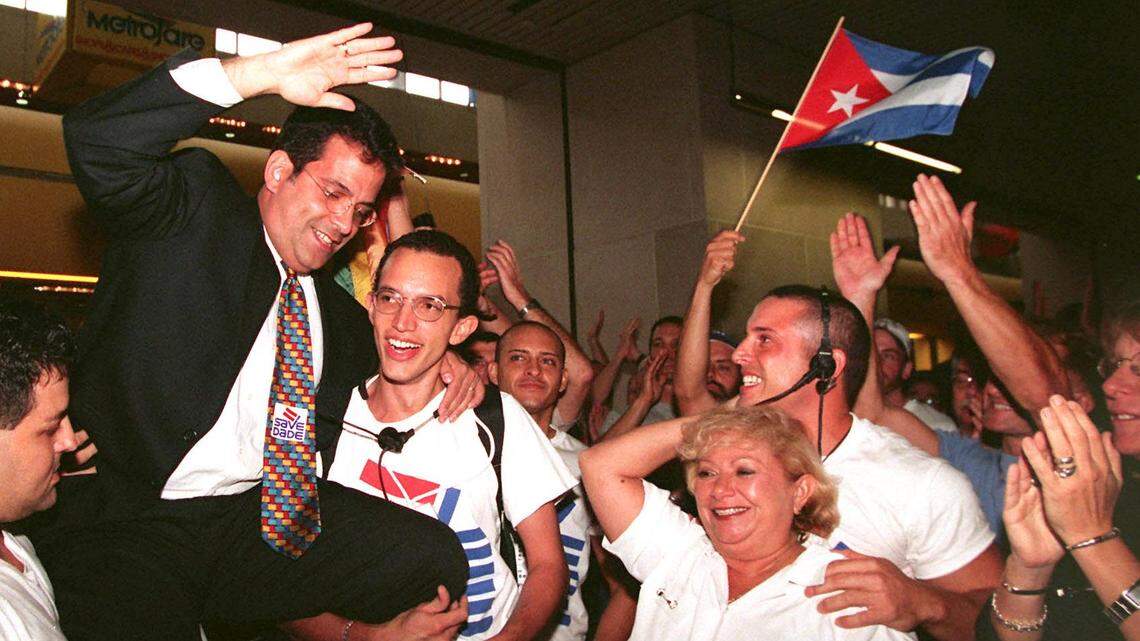 In 1998, Jorge Mursuli, of SAVE Dade, is hoisted in celebration after Miami-Dade commissioners voted to hold a public hearing on adding gay and lesbian people to those protected by the human-rights ordinance.