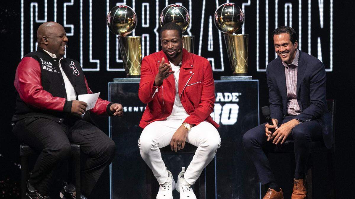 Miami Heat TV’s Jason Jackson, Dwyane Wade and Erik Spoelstra on stage during “The Flashback” event for at the AmericanAirlines Arena on Friday, February 21, 2020.