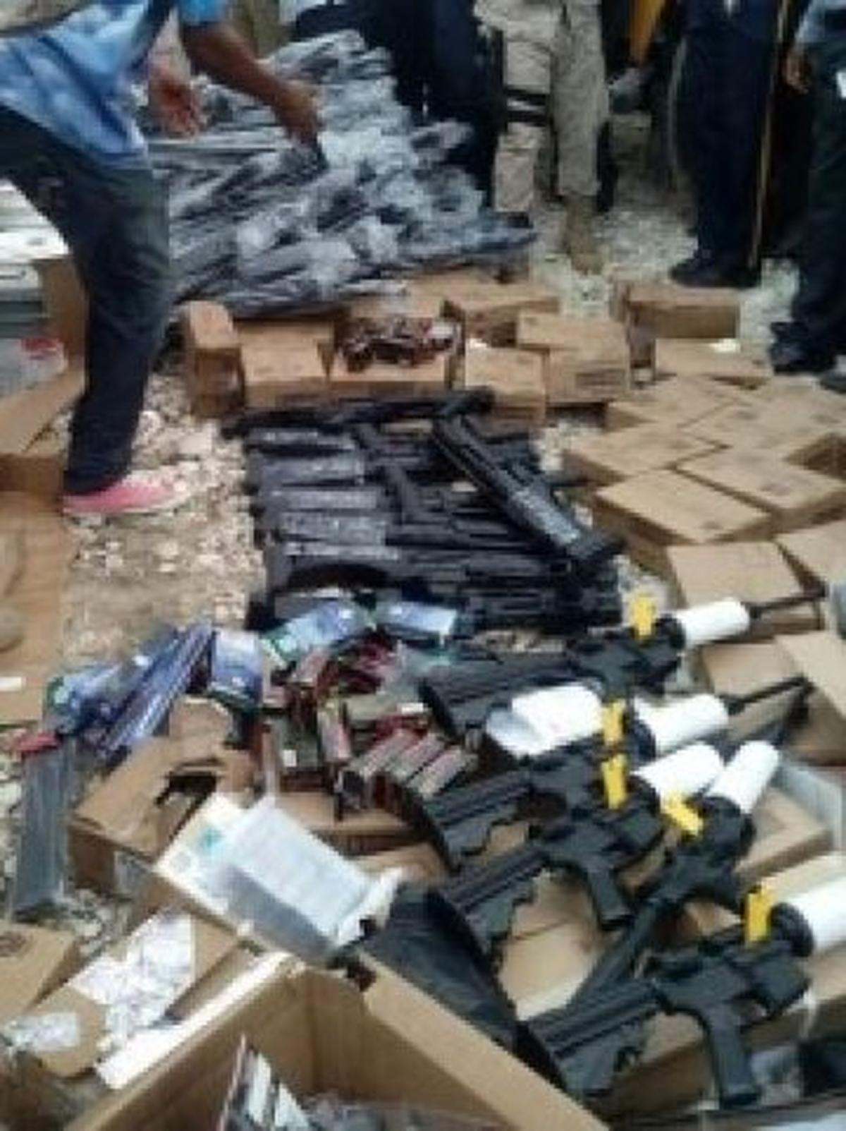 In September 2016 in the port of St. Marc Haitian police and customs agents seized 164 semi-automatic weapons, ammunition and other defense articles hidden in the back of Mitsubishi truck illegally shipped from Palm Beach County. The photo was among several exhibits the U.S. government introduced in a Fort Lauderdale federal court room as evidence in an illegal firearms trafficking case.