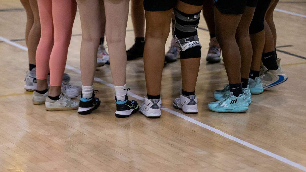 The Miami Palmetto Senior High School Lady Panthers huddle before the start of their basketball game against the Miami Senior High School Lady Stings at Miami Senior High School on Friday, Feb. 3, 2023.