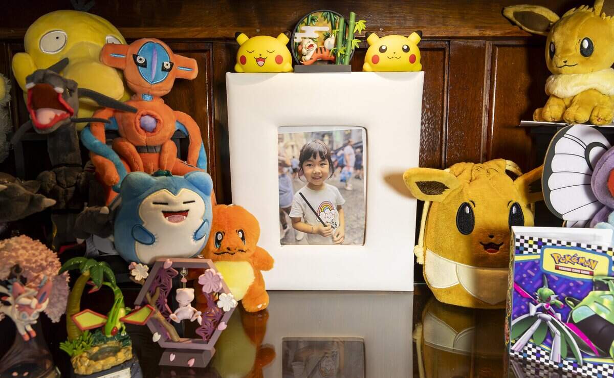 A photograph of Harlow Jet Tran, 6, is surrounded by some of her toys at the home of her parents, Danny Tran and Samari Curbelo, on Wednesday, June 3, 2026, in Coral Springs, Fla. Harlow was killed during a Coral Springs Police Department chase on May 5, 2024, and the family has filed a wrongful-death lawsuit against the city.