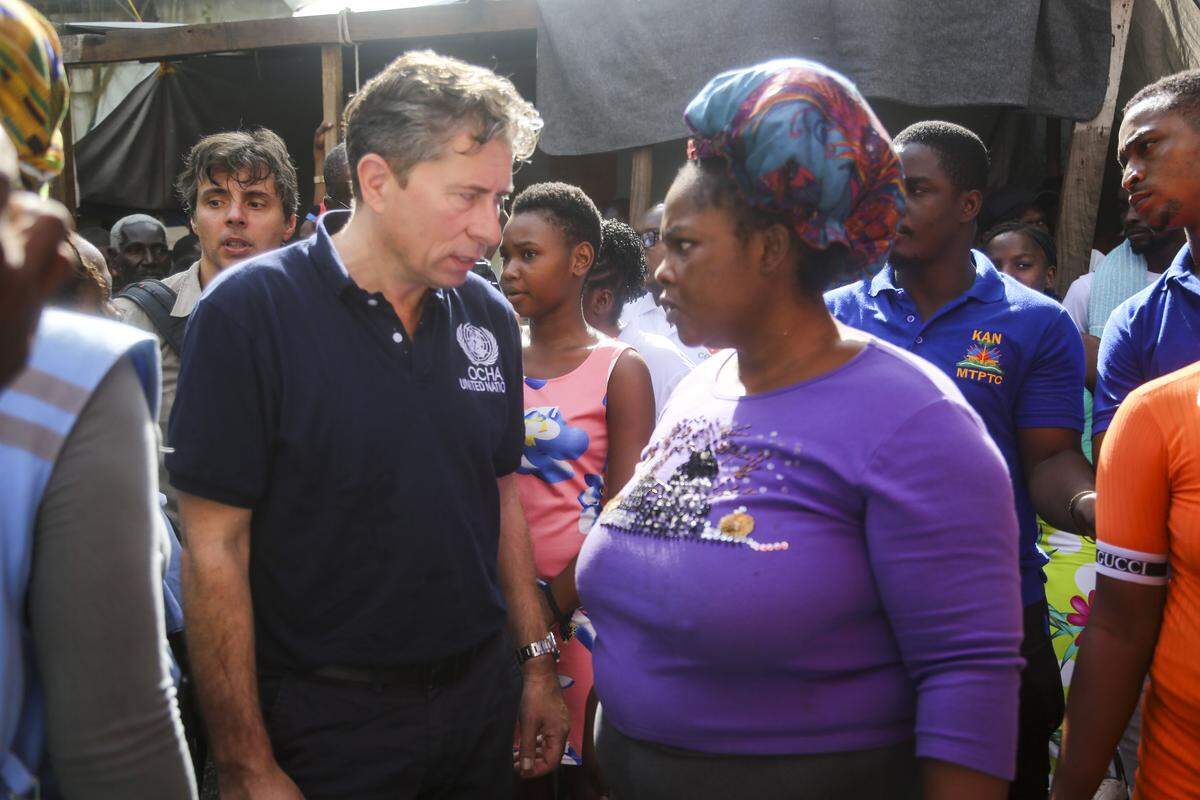 United Nations Under-Secretary-General for Humanitarian Affairs and Emergency Relief Coordinator, Tom Fletcher, speaks with a mother inside a displacement camp on Tuesday, September 9, 2025. The 33-year-mother of three says she conditions are awful inside the camp, forcing her to live separately from two of her children.