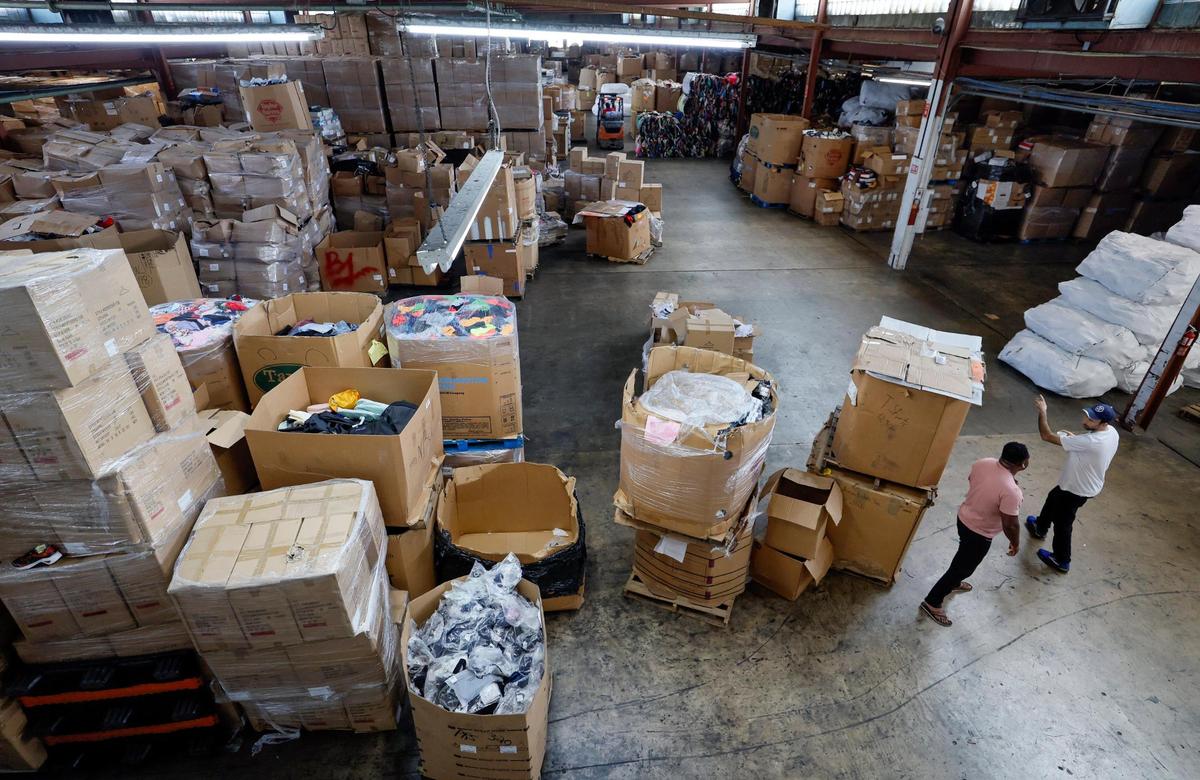 The inside of the warehouse area of Sneaker Impact, a 75,000 square foot recycling center in Little Haiti on Wednesday, April 2, 2025.