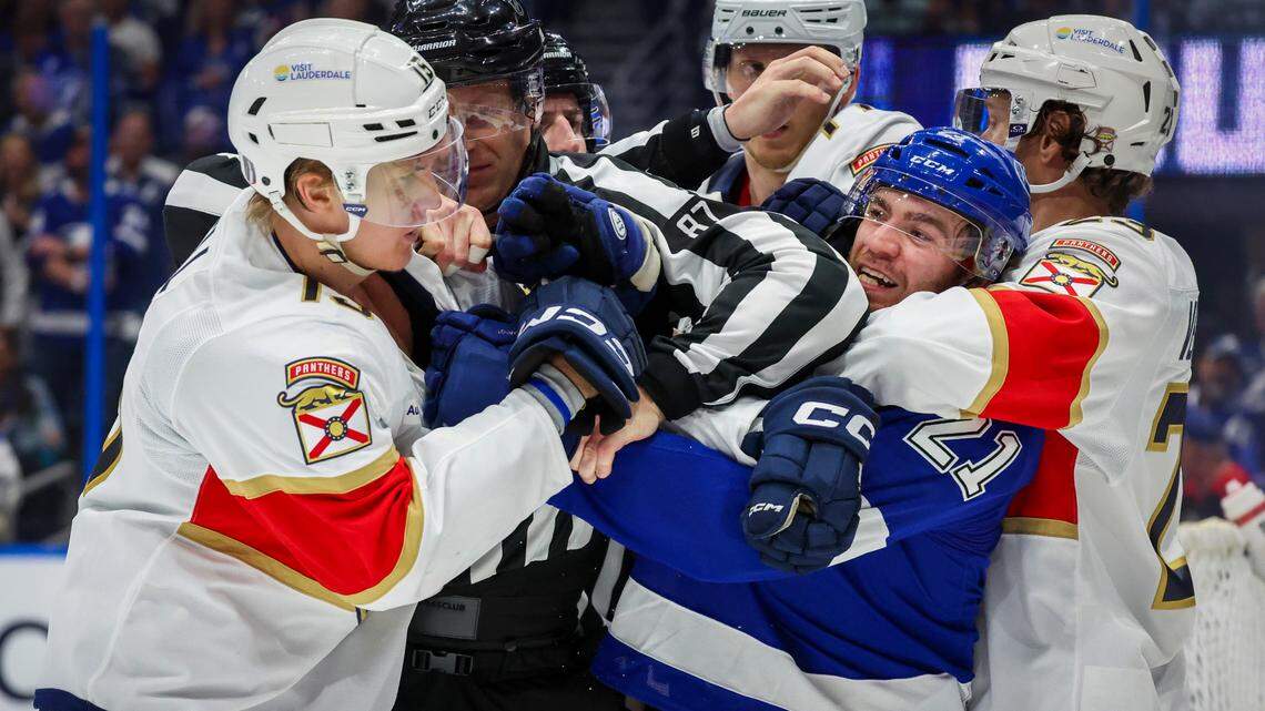 Florida Panthers center Anton Lundell (15), left, and Tampa Bay Lightning center Brayden Point (21) tangle during the third period in Game 2 of the first round in the Stanley Cup Playoffs Thursday, April 24, 2025 in Tampa.