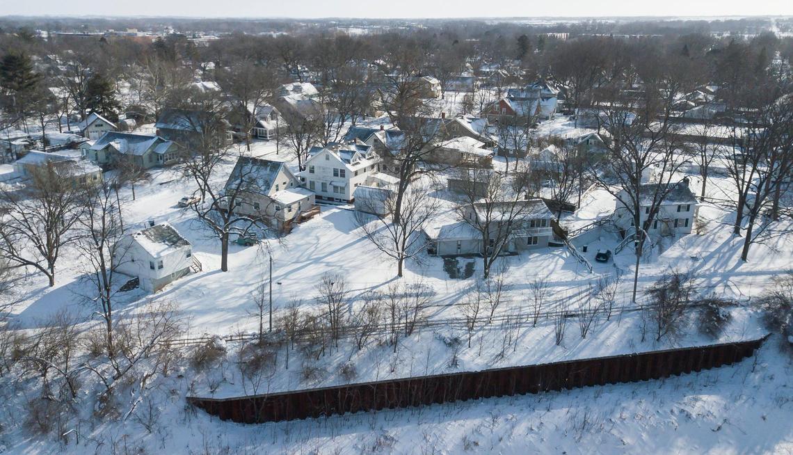 Aerial view shows how snow covers a neighborhood on Sunday, Jan. 14, 2024, in Ames, Iowa. Subzero temperatures have saddled the state ahead of the Iowa caucuses.