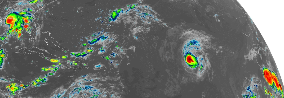 A satellite image taken at 4:45 p.m. Tuesday shows Gordon in the northern Gulf of Mexico, Florence in the North Atlantic and two waves rolling off the African coast. Source: National Oceanic and Atmospheric Administration