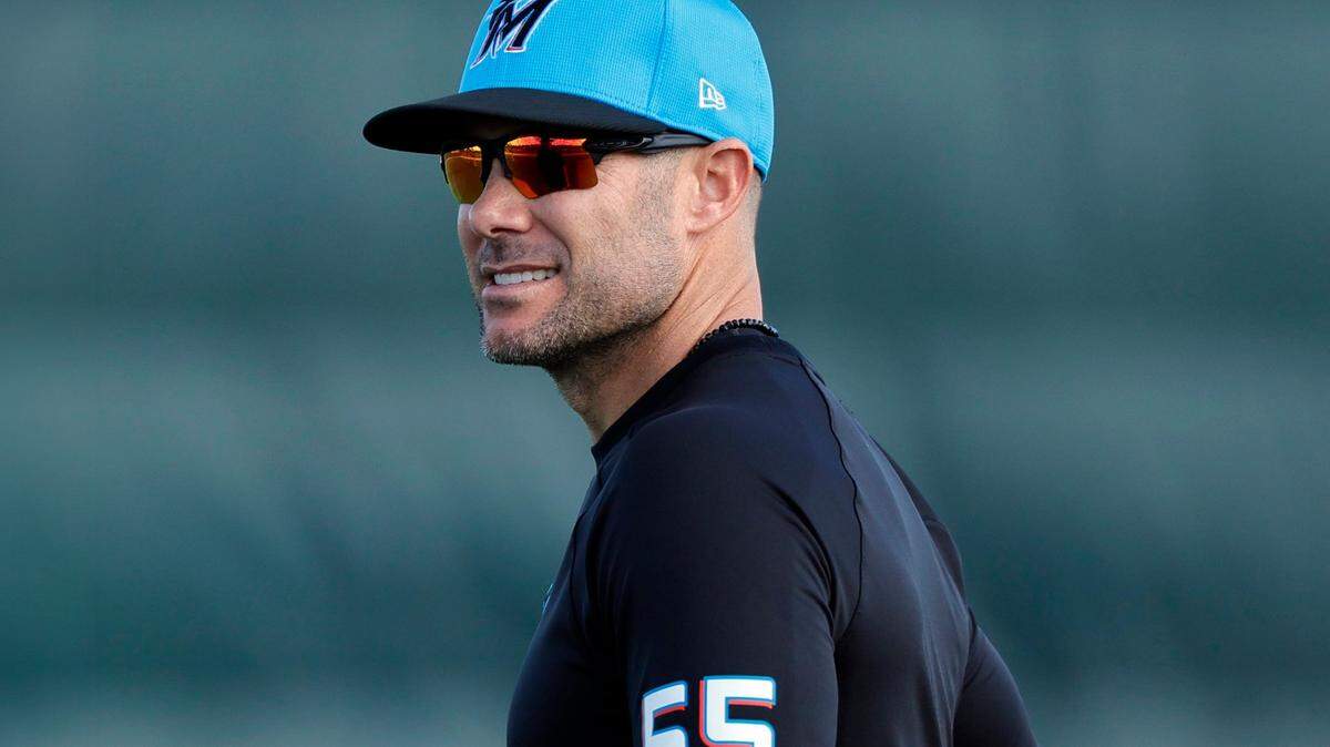 Miami Marlins manager Skip Schumaker joins the team on the field during the Marlins pitchers and catchers spring training workout at Roger Dean Chevrolet Stadium in Jupiter, Florida on Thursday, February 15, 2024.