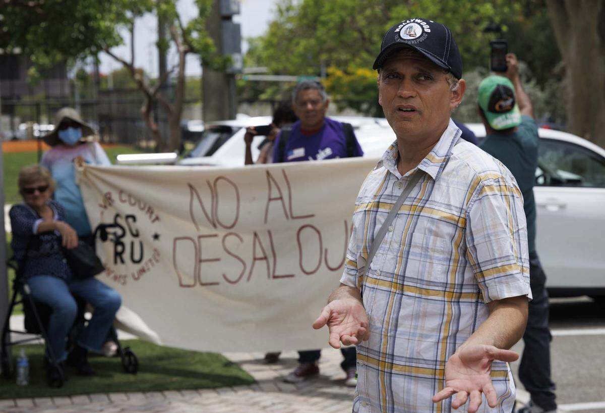 Joseph Madera, HOA president of the trailer park and resident since 2016, speaks during a protest outside of Miami District 4 Commissioner Ralph Rosado's office on Wednesday, May 27, 2026, at Coral Gate Park in Coral Gables, Fla. Madera has lived in the neighborhood since 1979. 