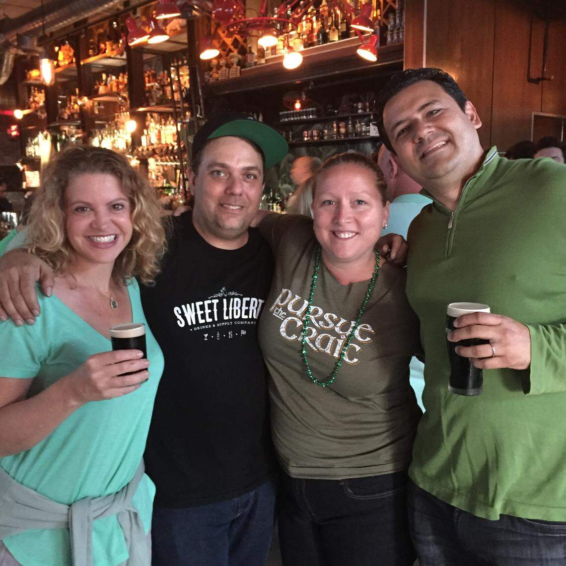 John Lermayer, center, opened Sweet Liberty bar in Miami Beach in 2015 with James Beard award-winning chef Michelle Bernstein, left, and her husband David Martinez, right.