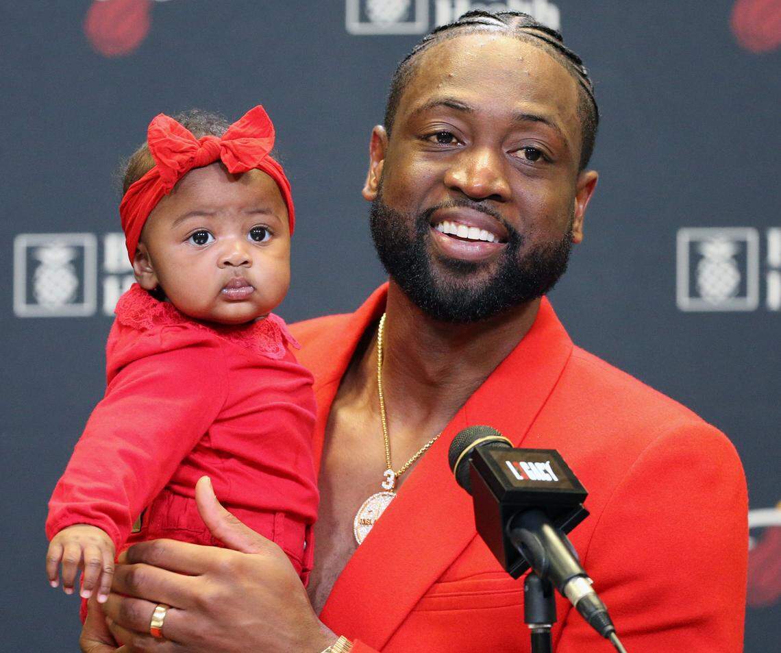 Miami Heat guard Dwyane Wade (3) with his daughter Kaavia during press conference after the Miami Heat host the Philadelphia 76ers at the AmericanAirlines Arena in Miami on Tuesday, April 9, 2019.