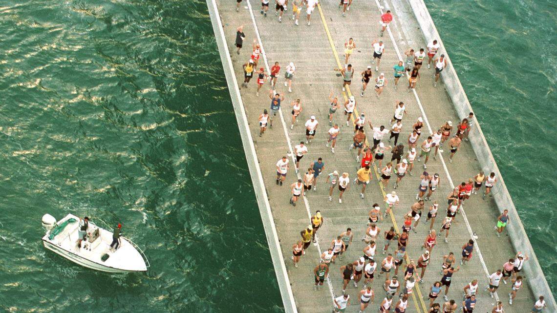 Boaters watch runners participating in the 20th Annual Seven Mile Bridge Run Saturday, April 21, 2001, race across the longest of 42 bridges that help comprise the Florida Keys’ Overseas Highway. Keeping active can help get rid of the extra weight around your midsection that can come with age and a more sedentary lifestyle.