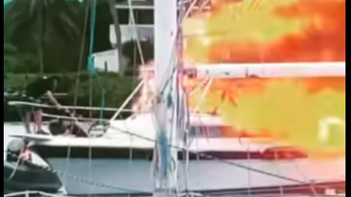 Video shows the explosion happened as Marine Deputy Buddy Sprott and Deputy Dan Hill were working to pull an unconscious man out of the boat.