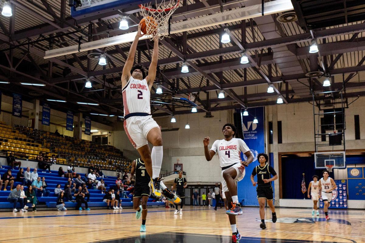 Columbus forward Cayden Boozer (2) leaps for a dunk during the first half of the GMAC Basketball Finals against Miami High at Miami-Dade Kendall campus gym in Miami, Florida on Saturday, January 27, 2024.
