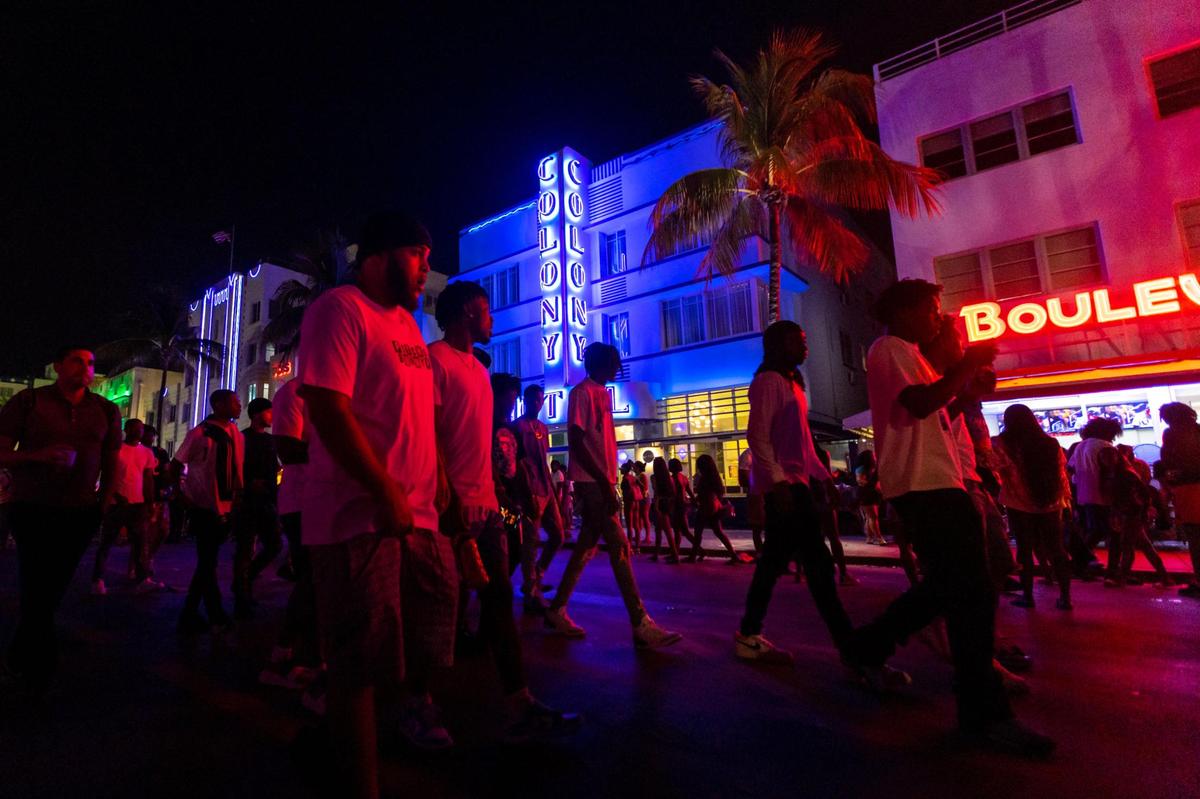 Crowds walk up and down Ocean Drive during Spring Break in Miami Beach, Florida, on Saturday, March 18, 2023.
