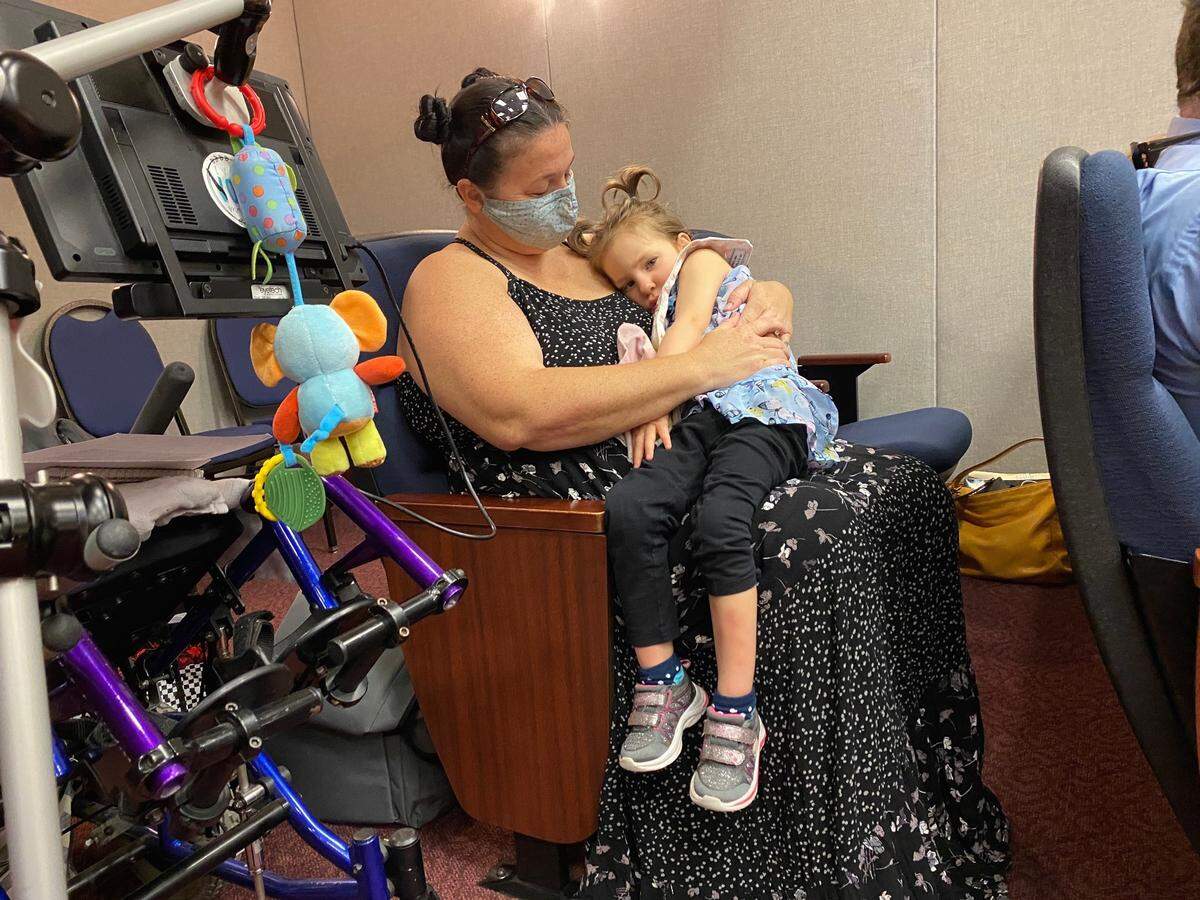 Jayme O’Connell, with her daughter Ivy, who is in the NICA program, said she is grateful for NICA but that it needs to be fixed.