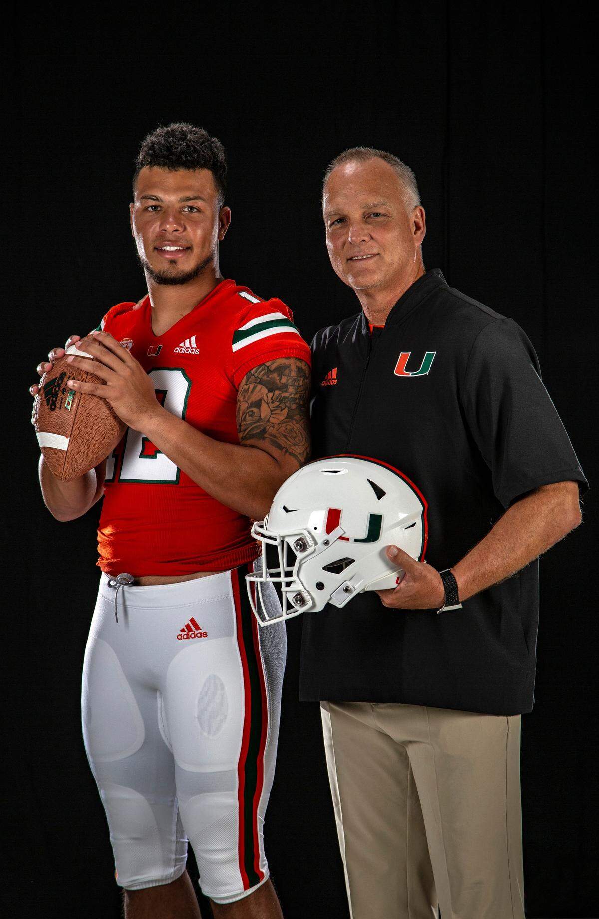 UM quarterback Malik Rosier with head coach Mark Richt as they pose for a photograph at the University of Miami Schwartz Center for Athletic Excellence on Thursday, August 9, 2018.