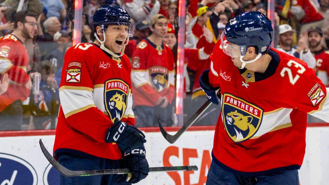 Florida Panthers center Sam Reinhart (13) reacts with teammates after scoring on New York Rangers goalie Jonathan Quick (32) during the first period of an NHL game at Amerant Bank Arena in Sunrise, Florida, on Friday, December 29, 2023.