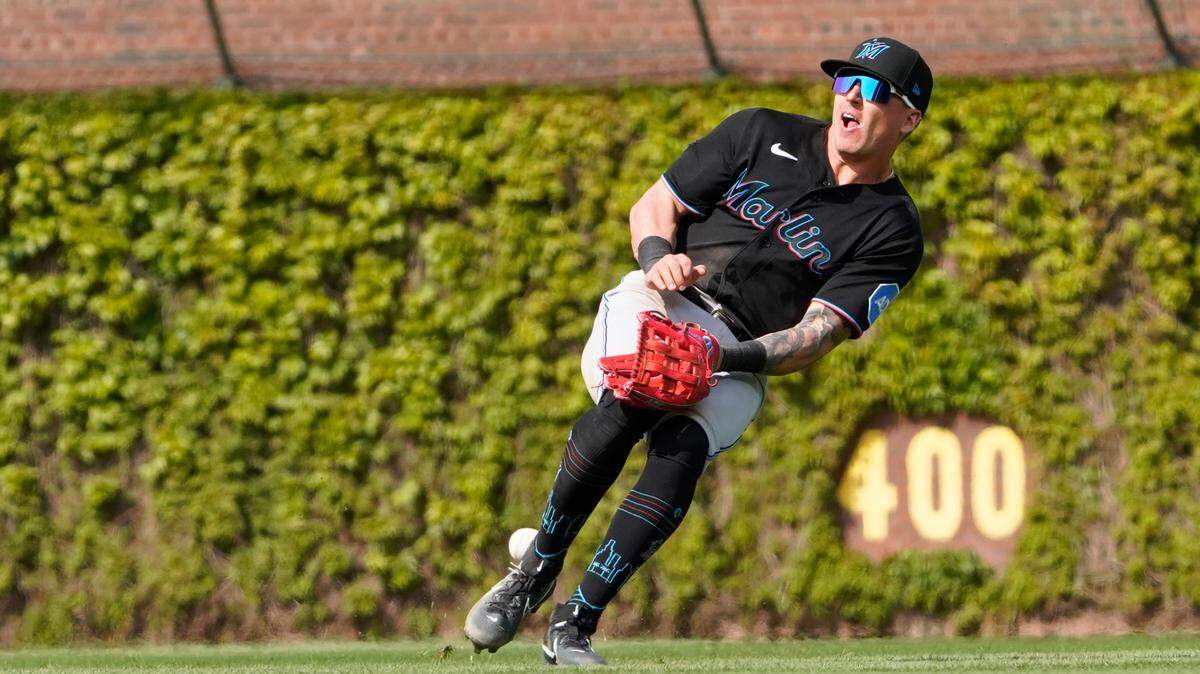 Miami Marlins right fielder Peyton Burdick (6) can’t make a play on Chicago Cubs designated hitter Trey Mancini (not pictured) during the eighth inning at Wrigley Field on Saturday, May 6, 2023.